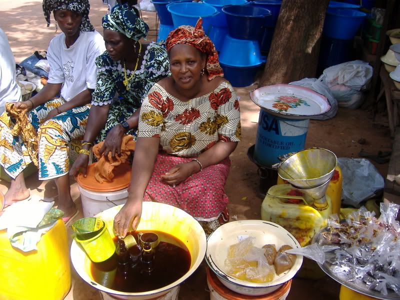 I buy my peanut butter from her. The red stuff is palm oil.