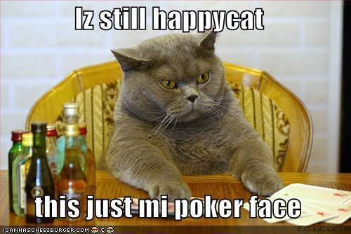 funny-pictures-happycat-poker-face.jpg